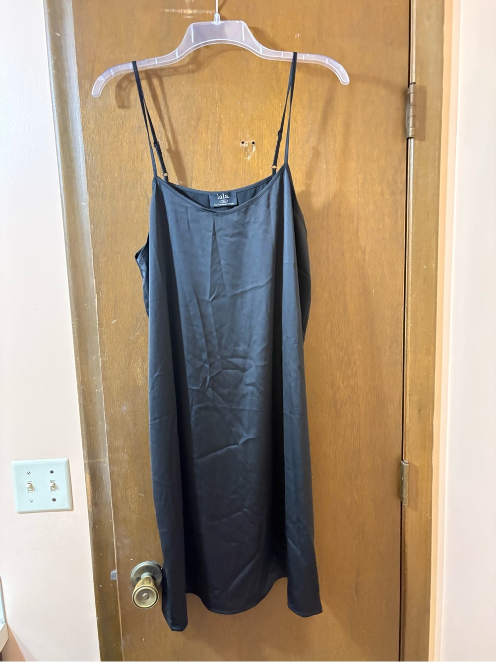 Dressed in Lala black satin slip dress
